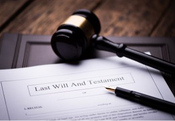 Last will and testament document with pen and gavel